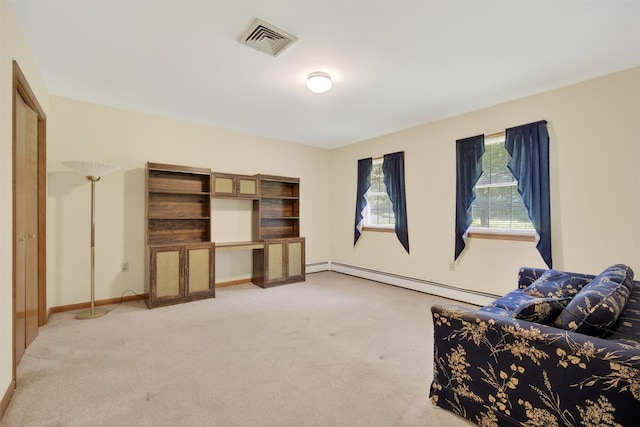 561 Toleman Rd, Rock Tavern, NY 12575 - sitting room with a baseboard radiator and light carpet