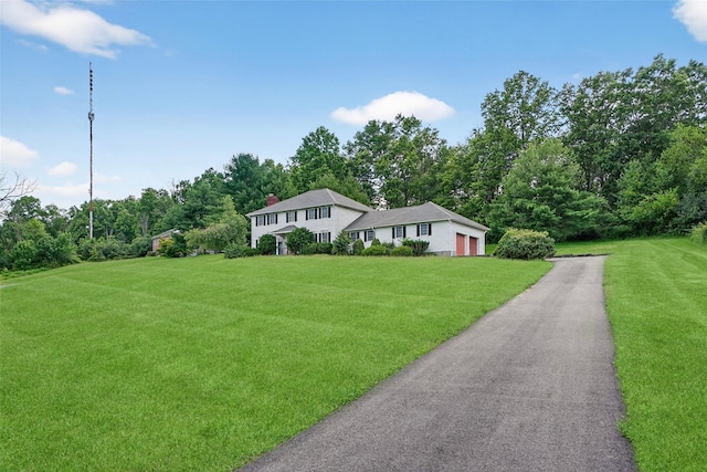 561 Toleman Rd, Rock Tavern, NY 12575 - colonial inspired home with an attached garage and a front lawn