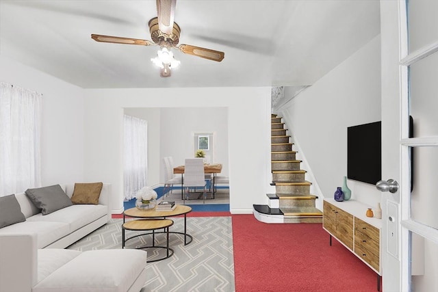 4419 Edson Ave, Bronx, NY 10466 - carpeted living area with stairway and ceiling fan