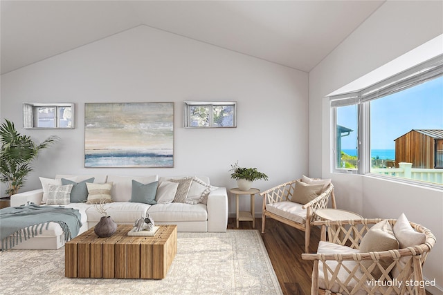 100 Deforest Rd Unit 701, Montauk, NY 11954 - living room with wood finished floors and lofted ceiling