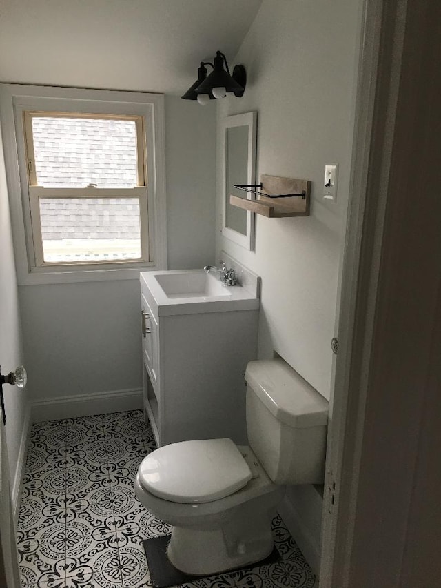 10 Dorothy Ct, South Merrick, NY 11566 - bathroom with vanity and tile patterned floors