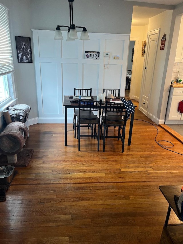 10 Dorothy Ct, South Merrick, NY 11566 - dining room featuring wood finished floors and baseboards