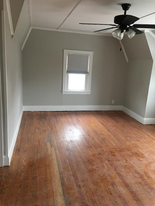 10 Dorothy Ct, South Merrick, NY 11566 - additional living space featuring hardwood / wood-style floors, a ceiling fan, and lofted ceiling
