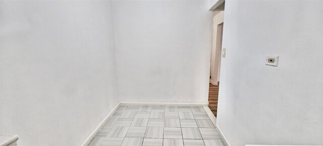 6615 Wetherole St Unit D12, Rego Park, NY 11374 - unfurnished room with baseboards
