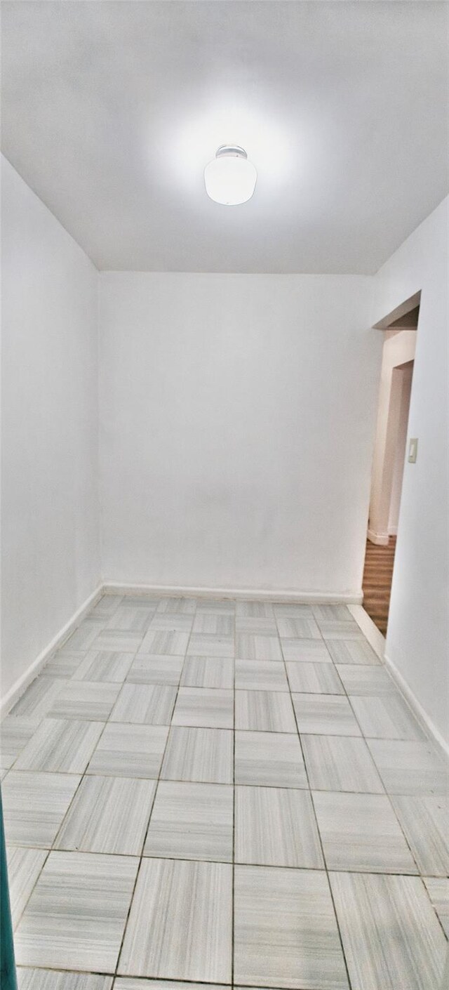 6615 Wetherole St Unit D12, Rego Park, NY 11374 - unfurnished room with baseboards