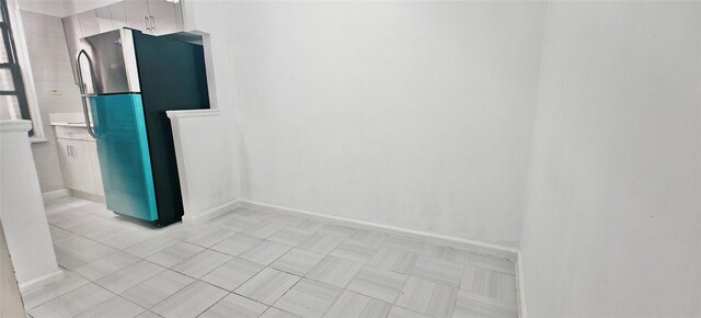 6615 Wetherole St Unit D12, Rego Park, NY 11374 - empty room with baseboards