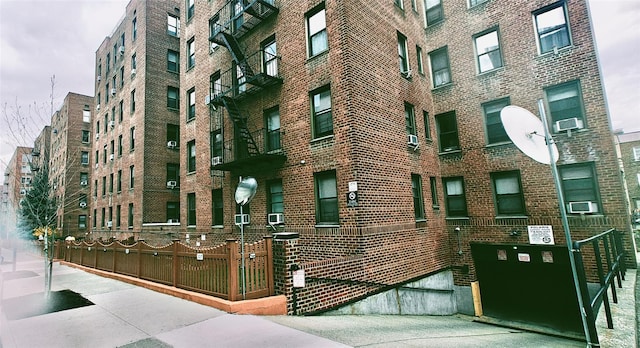 6615 Wetherole St Unit D12, Rego Park, NY 11374 - view of apartment building / complex featuring cooling unit
