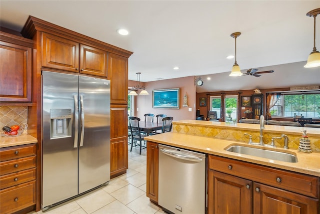 1 Angelica Ct, West Babylon, NY 11704 - kitchen with appliances with stainless steel finishes, a ceiling fan, pendant lighting, light tile patterned floors, and recessed lighting