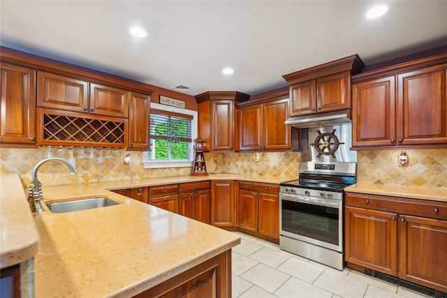 1 Angelica Ct, West Babylon, NY 11704 - kitchen featuring stainless steel electric stove, under cabinet range hood, tasteful backsplash, light tile patterned floors, and light stone countertops