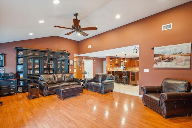 1 Angelica Ct, West Babylon, NY 11704 - living area featuring ceiling fan, light wood-style flooring, high vaulted ceiling, and recessed lighting