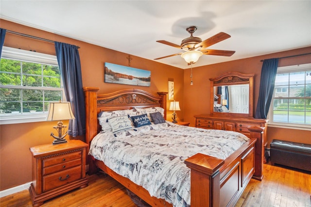 1 Angelica Ct, West Babylon, NY 11704 - bedroom with light wood-style floors and a ceiling fan