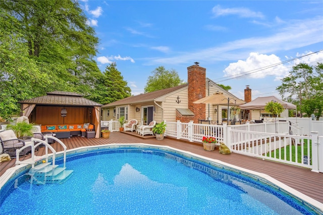 1 Angelica Ct, West Babylon, NY 11704 - swimming pool with a gazebo, an outdoor hangout area, and a wooden deck