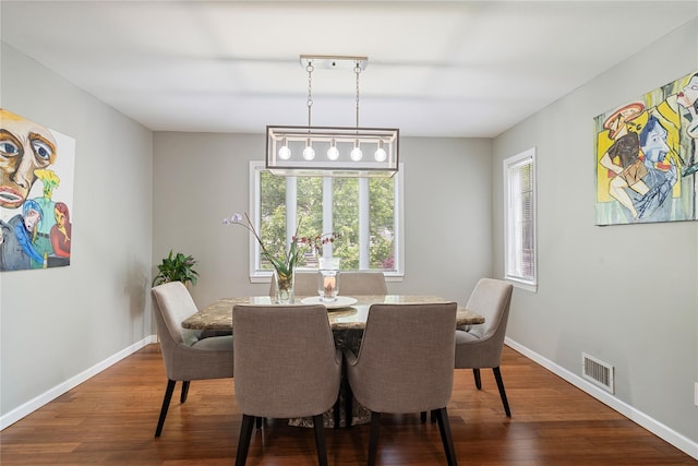 22 Pomper Dr, East Northport, NY 11731 - dining room with dark wood-style floors and plenty of natural light
