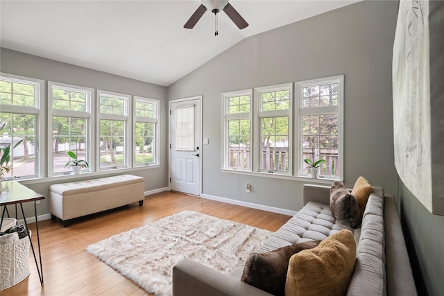 22 Pomper Dr, East Northport, NY 11731 - living room featuring vaulted ceiling, a ceiling fan, and light wood-type flooring