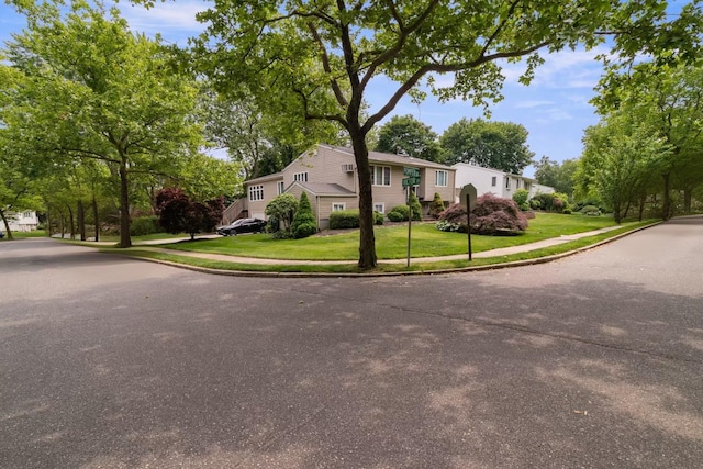 22 Pomper Dr, East Northport, NY 11731 - view of front of property with a front lawn, asphalt driveway, and an attached garage