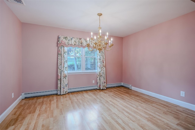 101 Wilson Dr, Port Jefferson Village, NY 11777 - unfurnished room featuring a chandelier and wood finished floors