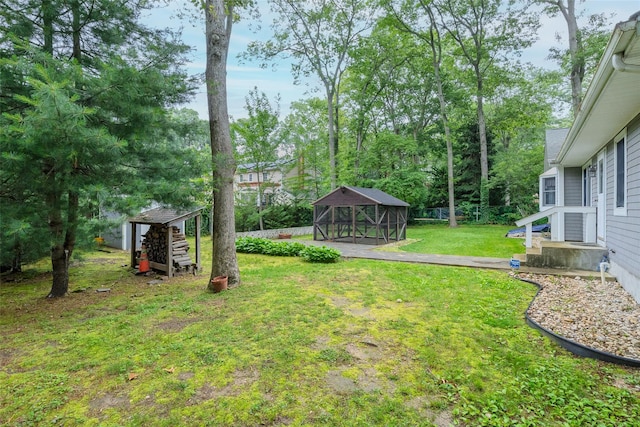 101 Wilson Dr, Port Jefferson Village, NY 11777 - view of green lawn featuring an outbuilding