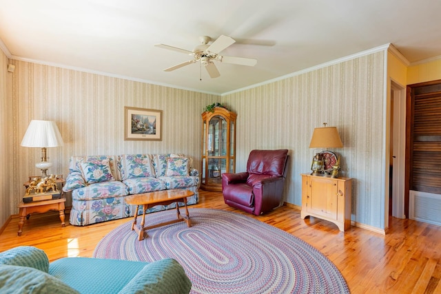 1668 Manatuck Blvd, Bay Shore, NY 11706 - living area featuring wood finished floors, wallpapered walls, ceiling fan, and crown molding