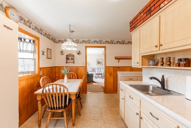 1668 Manatuck Blvd, Bay Shore, NY 11706 - kitchen featuring wainscoting, light countertops, wooden walls, and open shelves