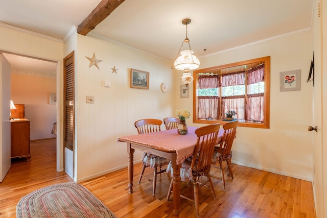 1668 Manatuck Blvd, Bay Shore, NY 11706 - dining room featuring crown molding and light wood finished floors
