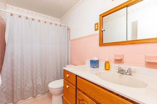 1668 Manatuck Blvd, Bay Shore, NY 11706 - bathroom featuring tile walls, vanity, curtained shower, and a wainscoted wall