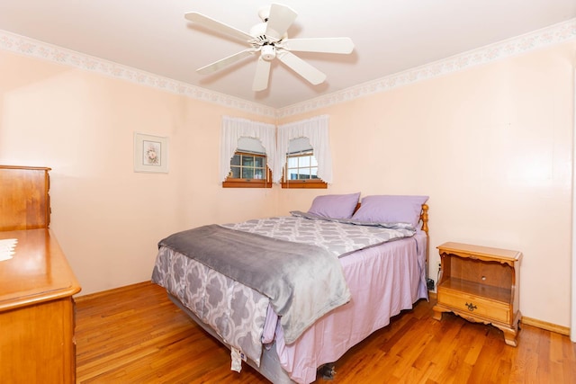1668 Manatuck Blvd, Bay Shore, NY 11706 - bedroom featuring wood finished floors and a ceiling fan