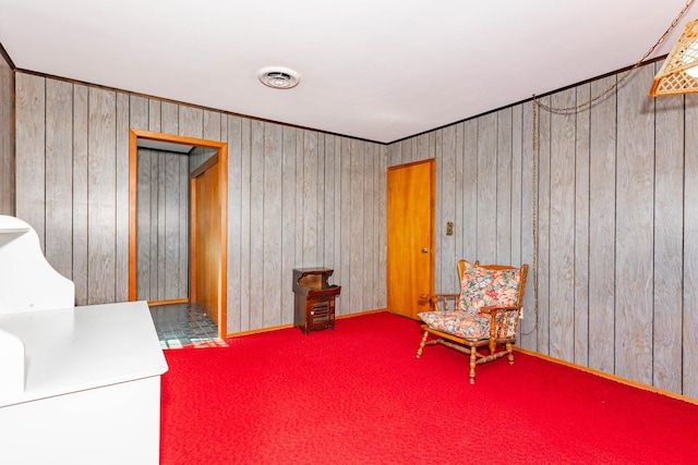 1668 Manatuck Blvd, Bay Shore, NY 11706 - living area featuring wood walls and carpet flooring