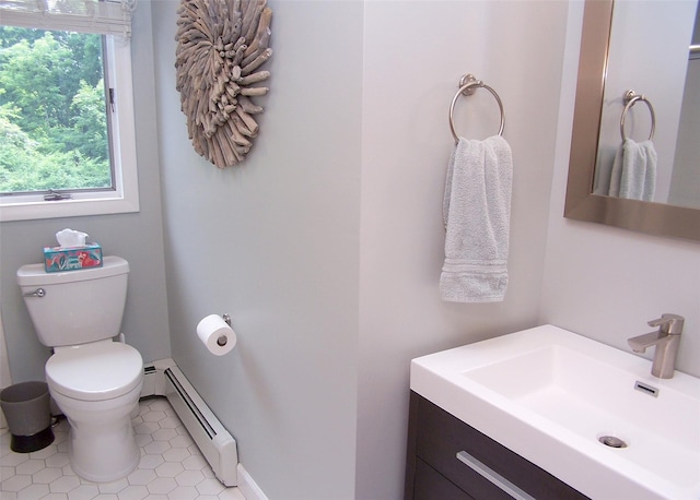 1778 Spur Dr S, Islip, NY 11751 - bathroom with a baseboard heating unit, vanity, and tile patterned flooring