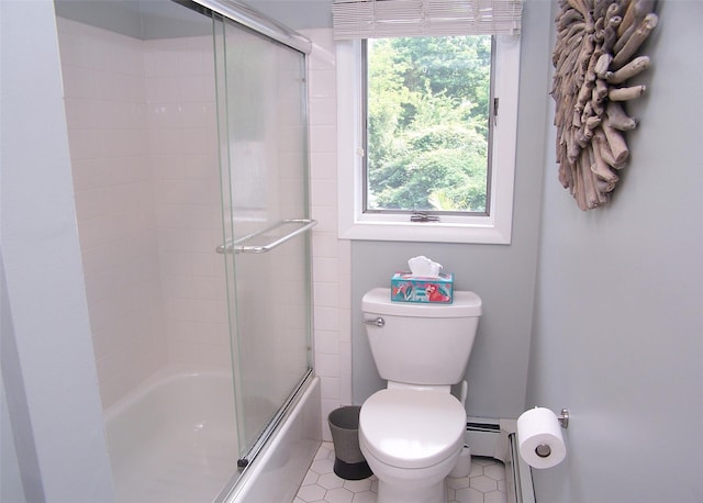 1778 Spur Dr S, Islip, NY 11751 - bathroom featuring combined bath / shower with glass door, tile patterned flooring, and baseboard heating