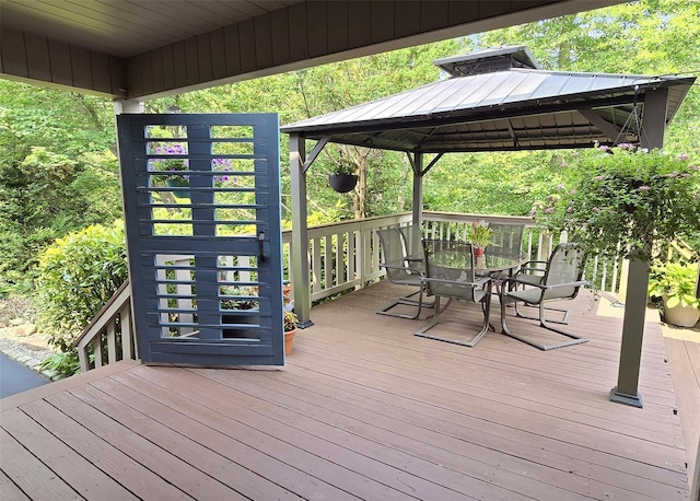 1778 Spur Dr S, Islip, NY 11751 - wooden terrace featuring outdoor dining area and a gazebo