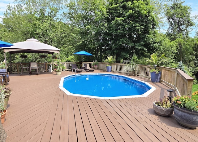 1778 Spur Dr S, Islip, NY 11751 - view of pool with a wooden deck and a gazebo