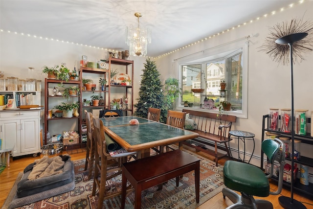 1222 Brook St, Peekskill, NY 10566 - dining room featuring light wood-style flooring and a chandelier
