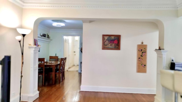 67-38 108st St Unit A53, Forest Hills, NY 11375 - hall with ornamental molding, wood finished floors, and arched walkways