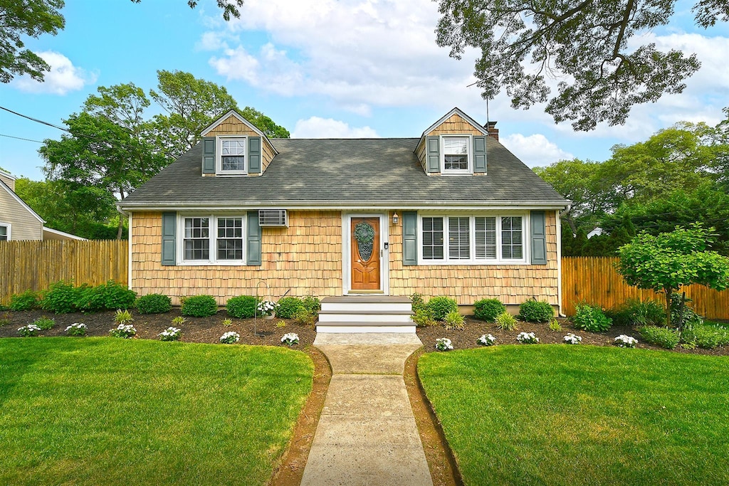 176 Melville Rd, South Huntington, NY 11746 - cape cod-style house featuring a chimney and a shingled roof