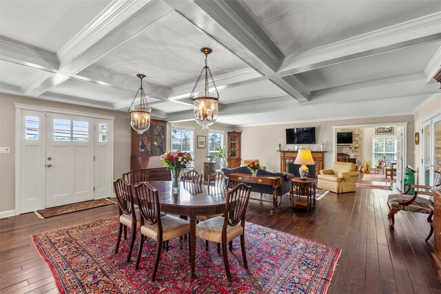 16 Dyke Rd, Setauket, NY 11733 - dining area with dark wood-style floors, coffered ceiling, a chandelier, beamed ceiling, and plenty of natural light