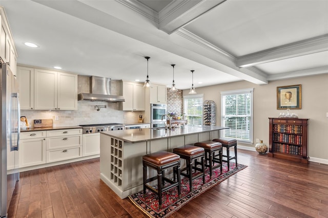 16 Dyke Rd, Setauket, NY 11733 - kitchen featuring wall chimney range hood, dark wood-style floors, white cabinets, beam ceiling, and appliances with stainless steel finishes