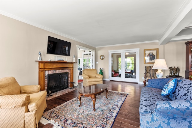 16 Dyke Rd, Setauket, NY 11733 - living area with wood finished floors, crown molding, and a brick fireplace