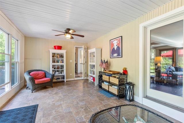 16 Dyke Rd, Setauket, NY 11733 - sitting room with stone tile flooring and ceiling fan