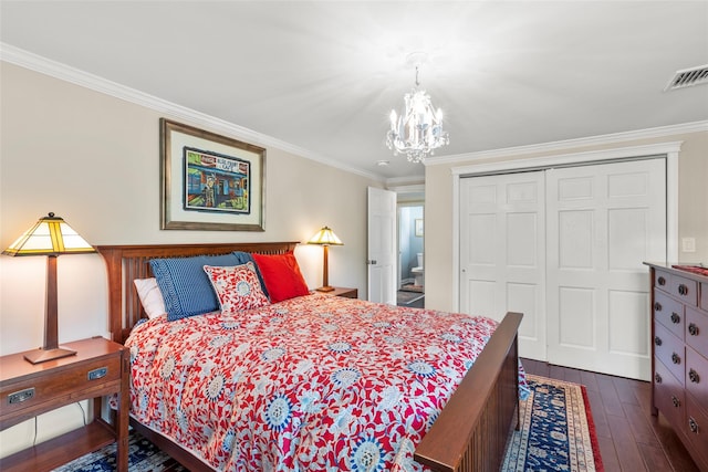 16 Dyke Rd, Setauket, NY 11733 - bedroom featuring a chandelier, dark wood finished floors, a closet, and crown molding