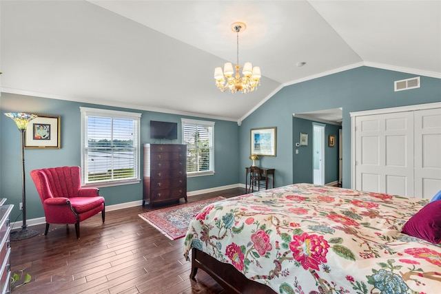16 Dyke Rd, Setauket, NY 11733 - bedroom featuring lofted ceiling, crown molding, a chandelier, wood finished floors, and a closet
