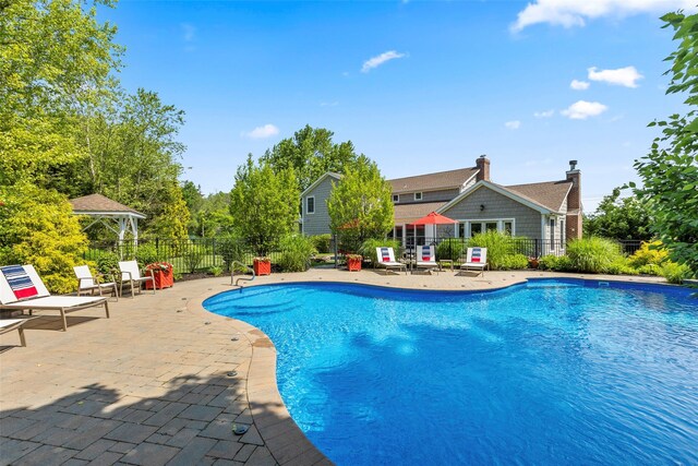 16 Dyke Rd, Setauket, NY 11733 - view of pool featuring a patio and a gazebo