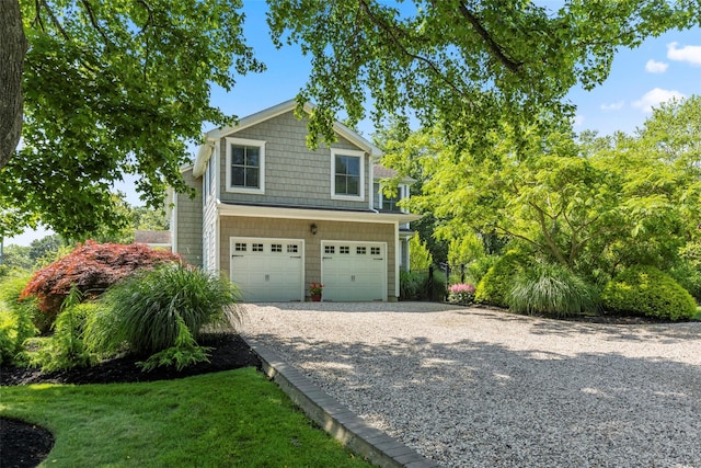 16 Dyke Rd, Setauket, NY 11733 - view of front of property featuring driveway and an attached garage