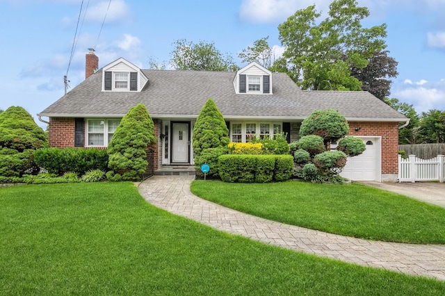 76 Roebling Pl E, Northport, NY 11731 - cape cod-style house with brick siding, a shingled roof, a chimney, a garage, and concrete driveway