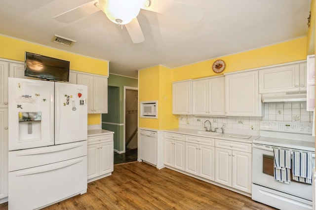 76 Roebling Pl E, Northport, NY 11731 - kitchen with white appliances, under cabinet range hood, tasteful backsplash, and ceiling fan