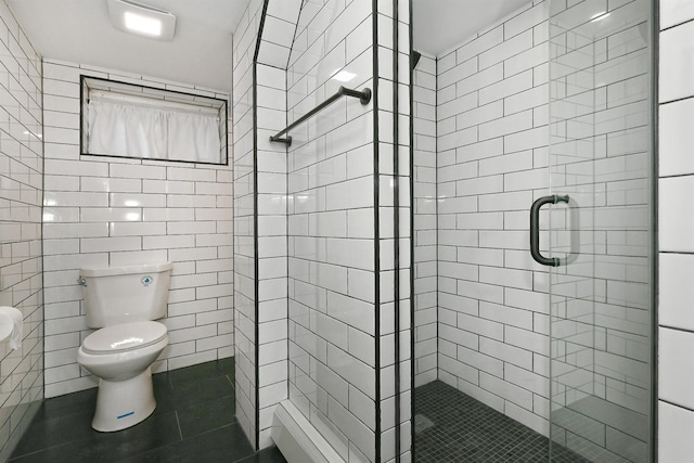 169-04 69th Ave, Fresh Meadows, NY 11365 - bathroom with a stall shower, tile patterned flooring, and tile walls