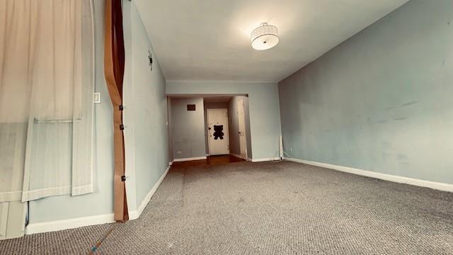 143-43 41 Unit 5C, Flushing, NY 11355 - unfurnished room with carpet floors and baseboards