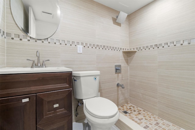 22019 135th Ave, Addisleigh Park, NY 11413 - full bath featuring vanity, tile walls, and a tile shower