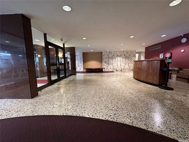 142-05 Roosevelt Ave Unit 721, Flushing, NY 11354 - reception area with recessed lighting, a community bar, and french doors