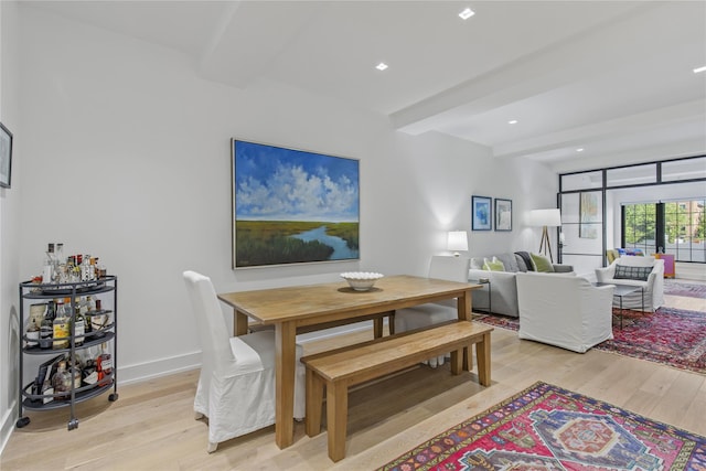 100 Pondfield Rd Unit 2B, Bronxville, NY 10708 - dining space with beamed ceiling, light wood finished floors, and recessed lighting