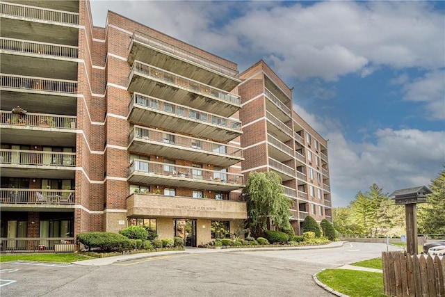1374 Midland Ave Unit Ph07, Bronxville, NY 10708 - view of apartment building / complex featuring uncovered parking